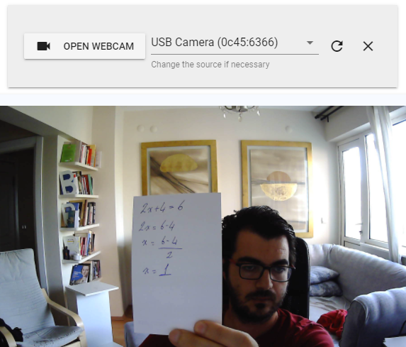 Question that the user responds by taking a photo via web cam or taking a screen shot of the computer