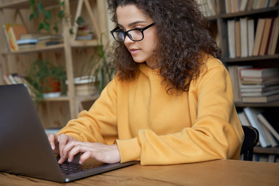 Student completing their online assessment as part of their education program