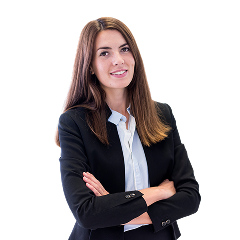 Woman in a business suit, representing an L&D manager role